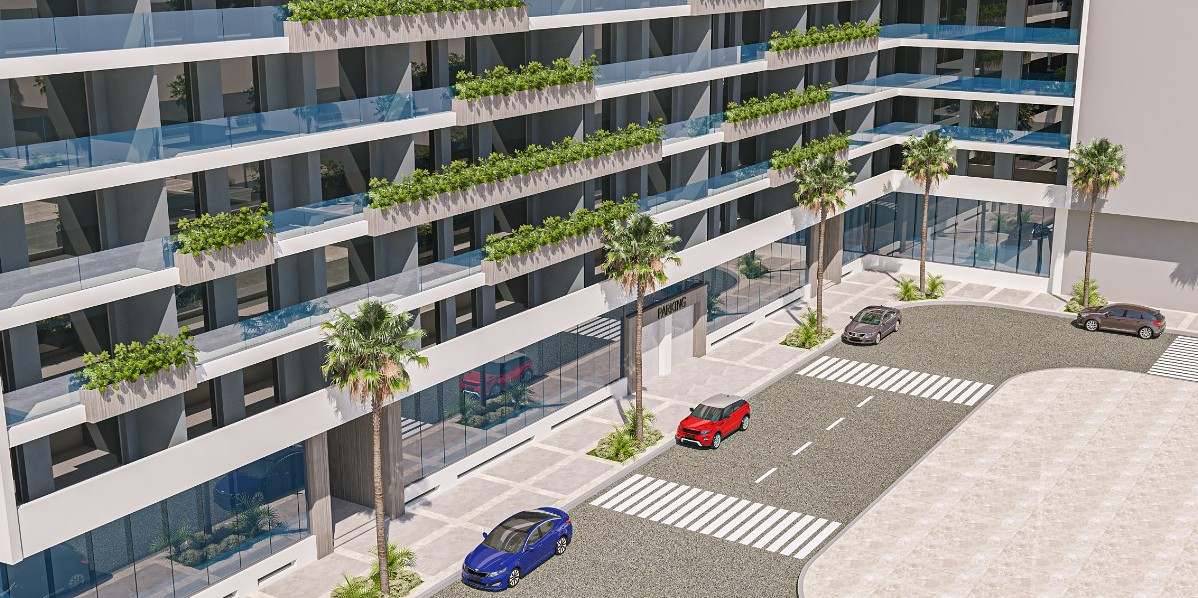 Vue plongeante sur la façade et ses balcons plantés, côté rue.